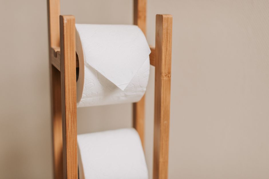 Why Put Toilet Paper Roll Under Seat — 2. Toilet Paper Roll as a Makeshift Seat Leveler