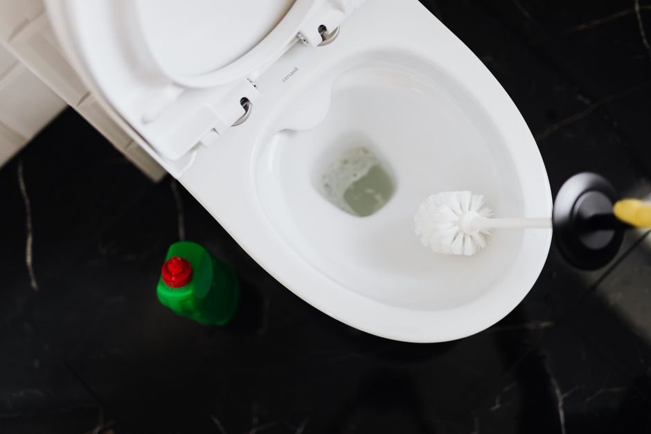 Why Is My Toilet Seat Turning Black — 1. Hard Water Deposits and Mineral Buildup