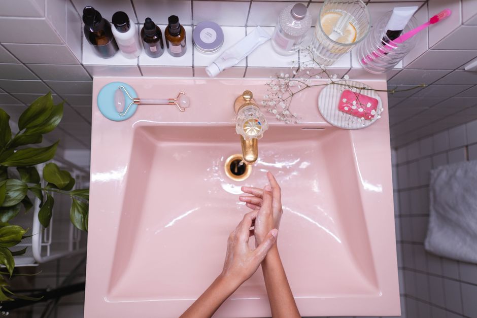 How To Organize Under Bathroom Sink — 1. Clear Everything Out and Clean Thoroughly