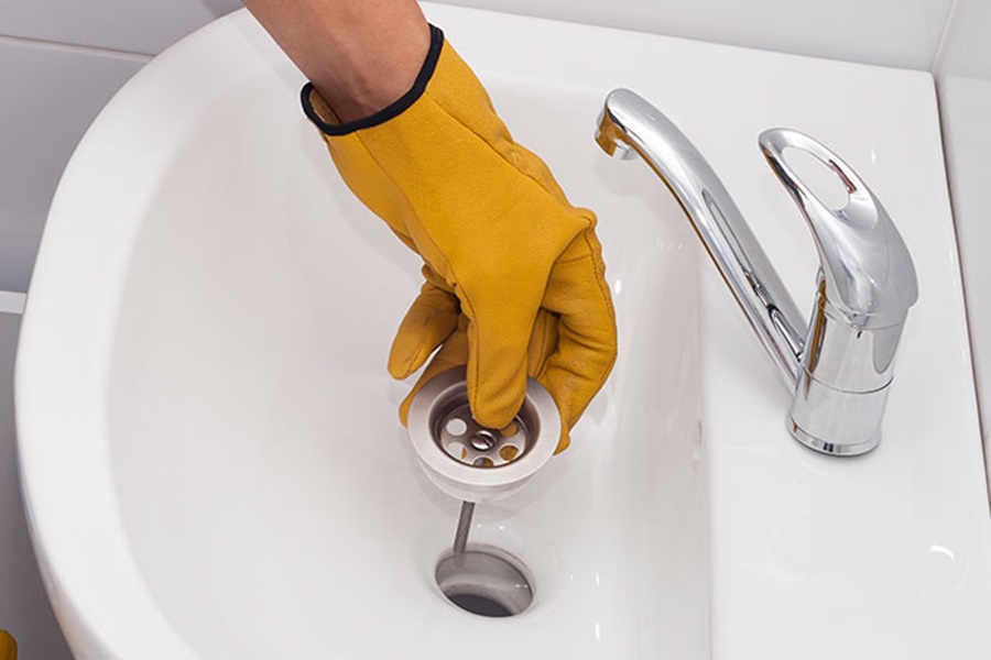 how to remove bathroom sink drain