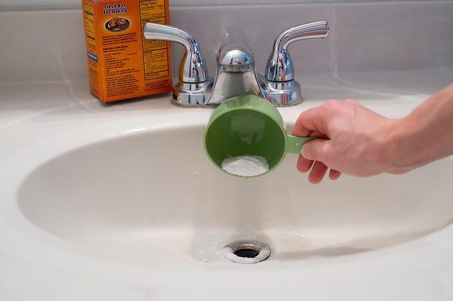 how to remove black sludge from bathroom sink